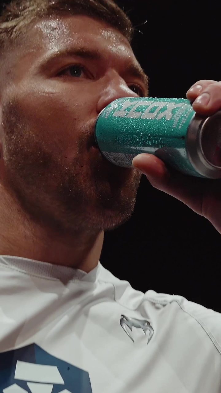 Dricus du Plessis drinks from a KNOX can